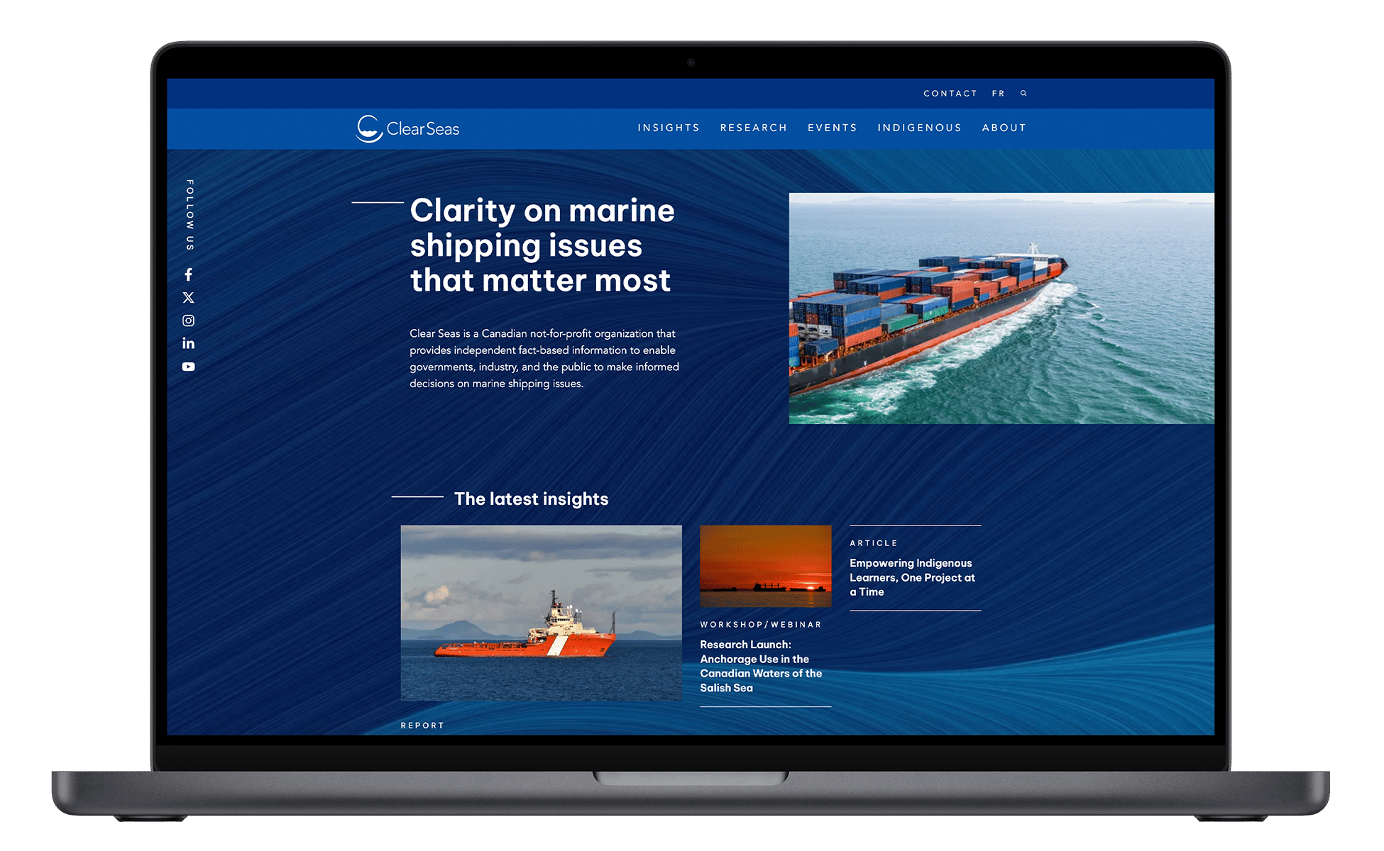 The Clear Seas homepage on a laptop, with the headline “Clarity on marine shipping issues that matter most” beside a container ship at sea.