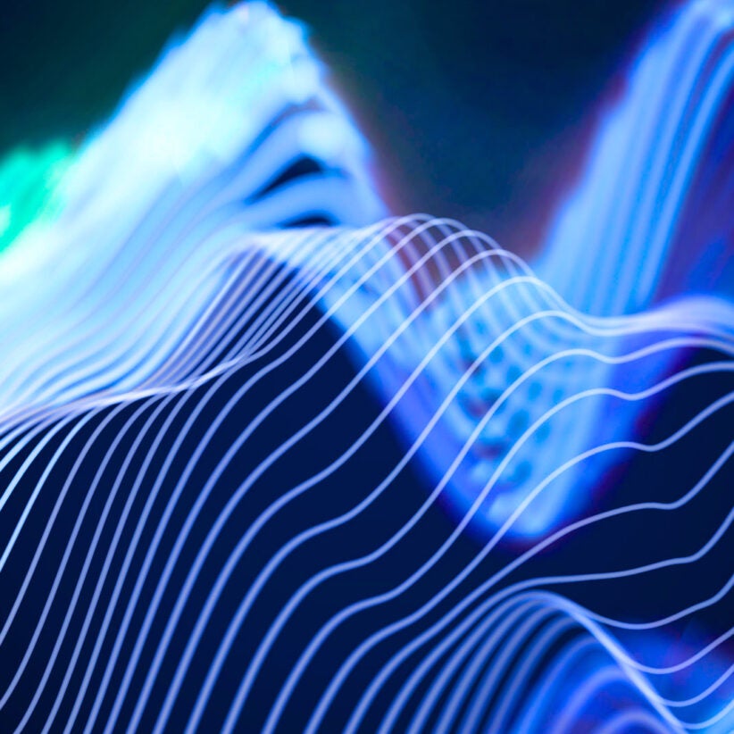 Different shades of blue wavelengths against a navy background.